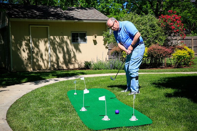 man golfing